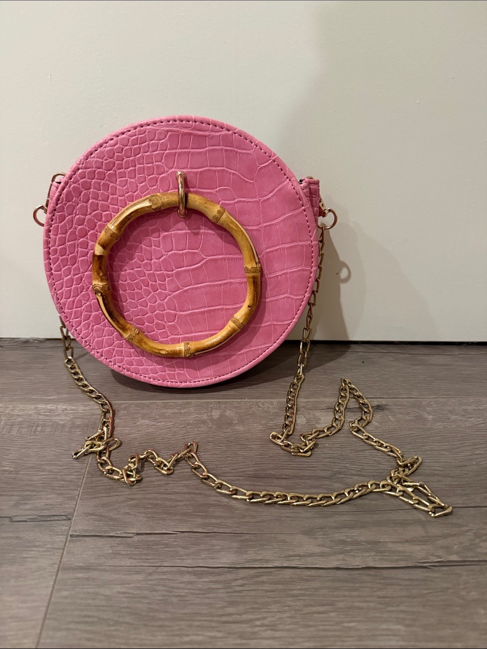 Round Pink Crossbody Bag with Bamboo Ring Accent
